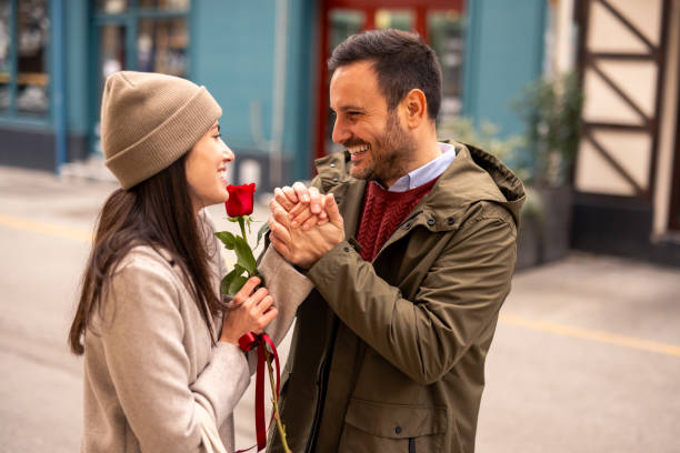 istock Joyful Caucasian Couple Sharing a Surprise Gesture 2189634084