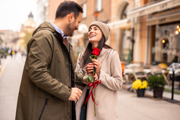 istock Caucasian Couple Joyfully Celebrating Love with Gift Giving 2189634091