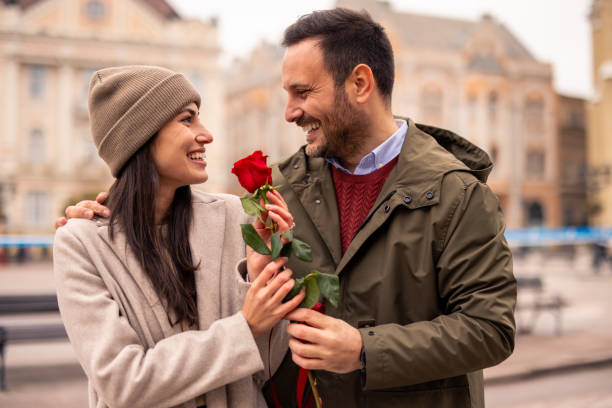 istock Happy Caucasian Couple Celebrating in Urban Setting 2189634135