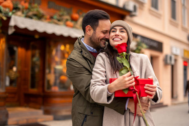 istock Joyful Caucasian Couple Sharing Romantic Valentine’s Day Gift 2189634203