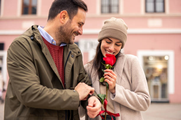 istock Happy Caucasian Couple Enjoying Valentine’s Day Stroll 2189634211