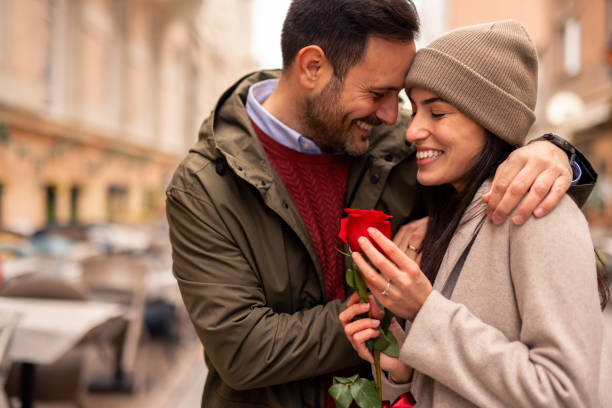 istock Caucasian Couple Joyfully Embracing and Sharing a Romantic Gesture 2189634237