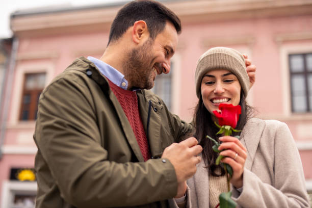 istock Smiling Caucasian Couple Enjoying Romantic Stroll 2189634357