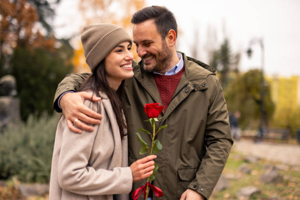 istock Cheerful Caucasian Couple Enjoying a Romantic Stroll 2189634414