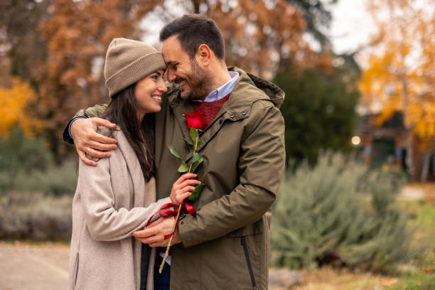 istock Joyful Caucasian Couple Embracing in Public Park 2189634448