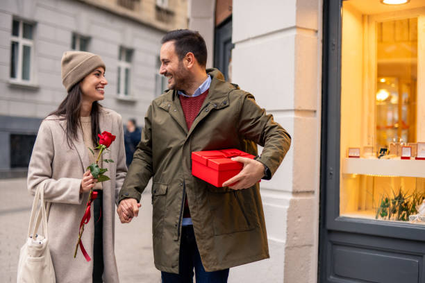 istock Smiling Caucasian Couple Strolling on Valentine’s Day 2189634648