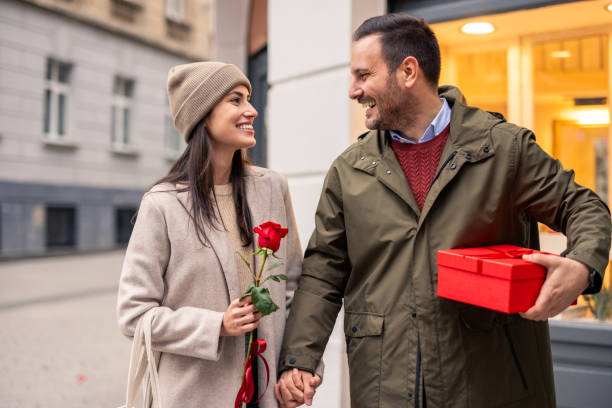 istock Happy Caucasian Couple Strolling on Valentine's Day 2189634728