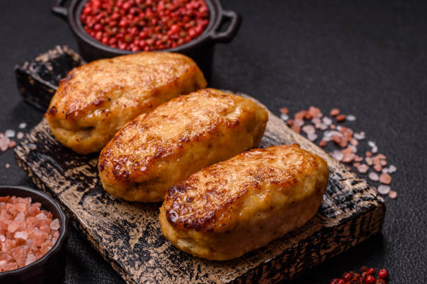 istock Delicious fresh fried minced fish cutlets with spices and herbs 2189635595
