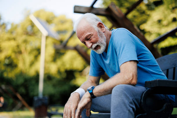 istock Tired senior sporty man resting on park bench 2189636681