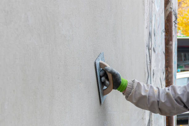 istock The process of applying plaster on the wall. 2189638139