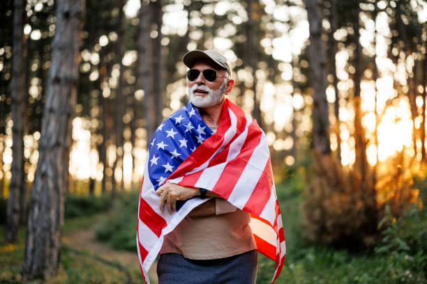 istock Authentic Vietnam Veteran with American Flag 2189641675