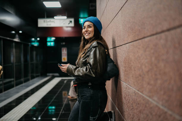 istock Young woman on a subway station 2189646478