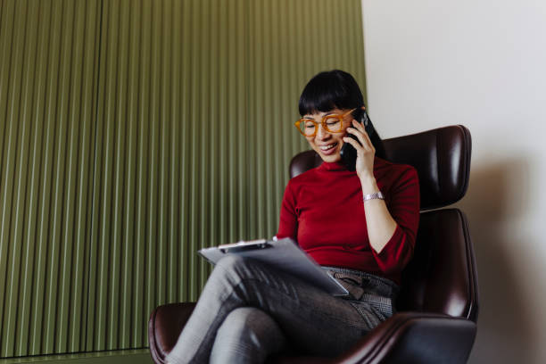 istock Businesswoman using phone 2189647349