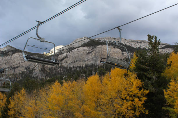 istock Ski Lift over Autumn Trees 2189647368