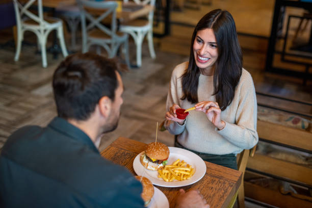istock Loving  couple eating in the restaurant 2189649299