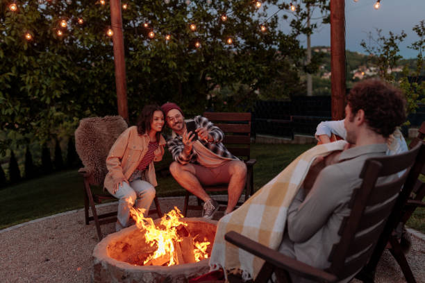 istock Friends taking a selfie on a cozy evening by the campfire 2189650968