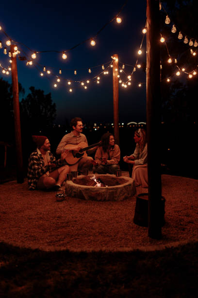 istock Friends singing along with a guitar on a summer night 2189650974
