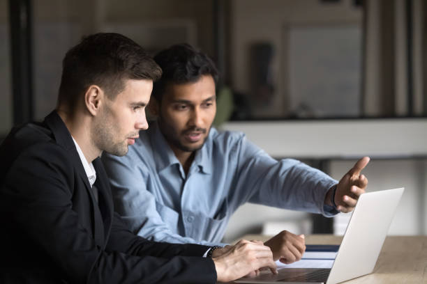 istock Sales manager presenting new product or service options to client 2189657714
