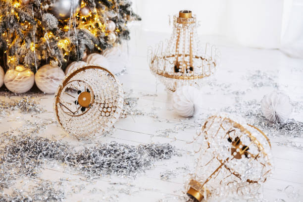 istock Festive winter decorations with Christmas tree and shimmering gift boxes 2189664113