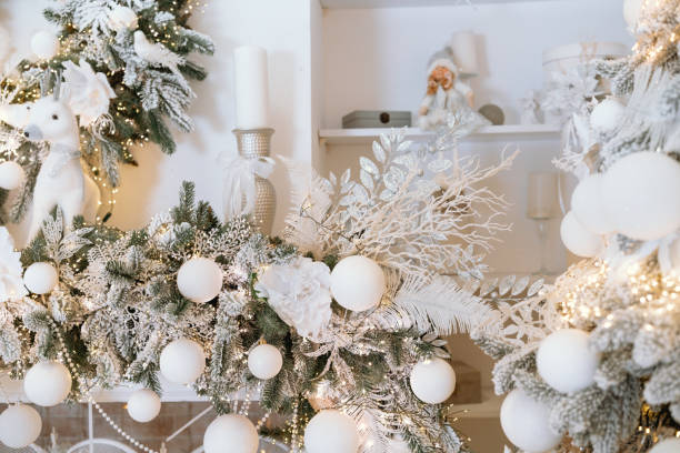 istock Christmas decor with white ornaments and greenery for winter festivity 2189664252