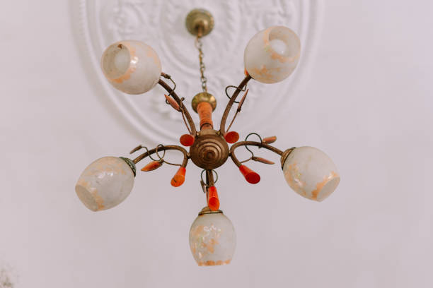 Elegant home lighting fixture with a sleek and modern design, illuminating the room with a warm ambiance