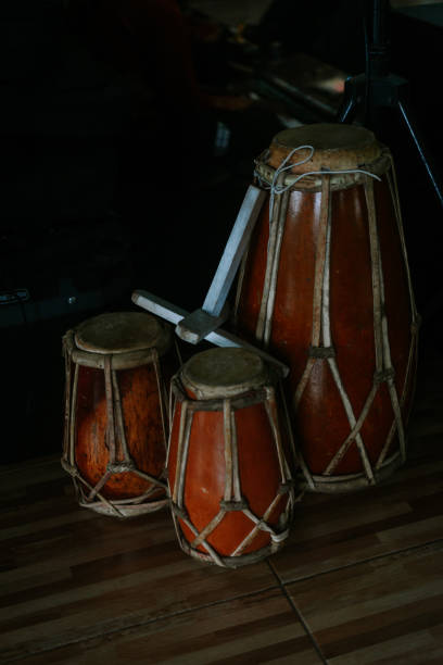 istock A traditional kendang drum with intricate carvings and natural materials, 2189674760