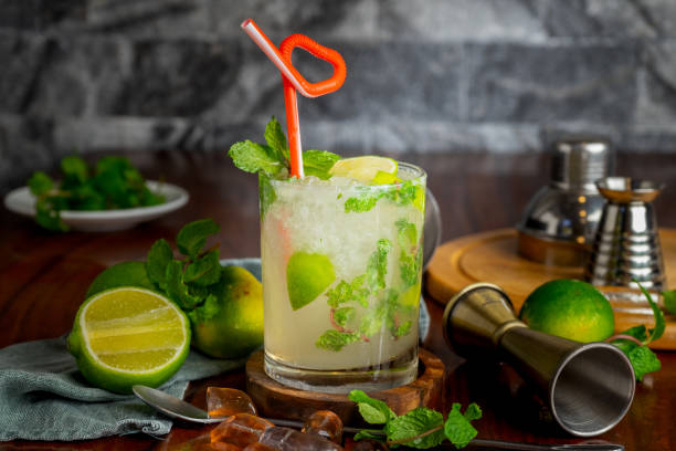 istock Close up mojito cocktail with slice lemon and fresh mint. Minimal trendy  cocktail 2189702186