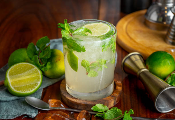 istock Close up mojito cocktail with slice lemon and fresh mint. Minimal trendy  cocktail 2189702883
