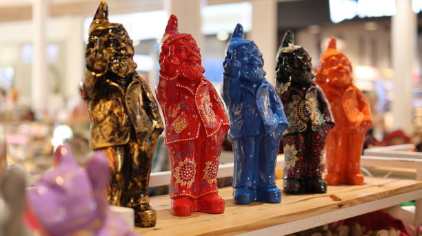 istock Colorful Shiny Dwarf Statuettes Showing middle Finger souvenirs 2189704113