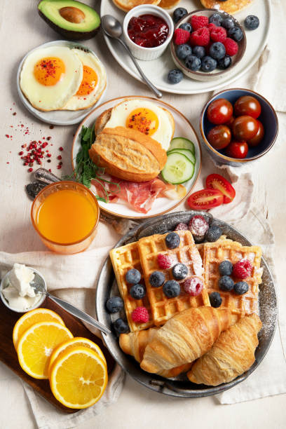 istock Fresh healthy breakfast. Table with full healthy breakfast. 2189710599