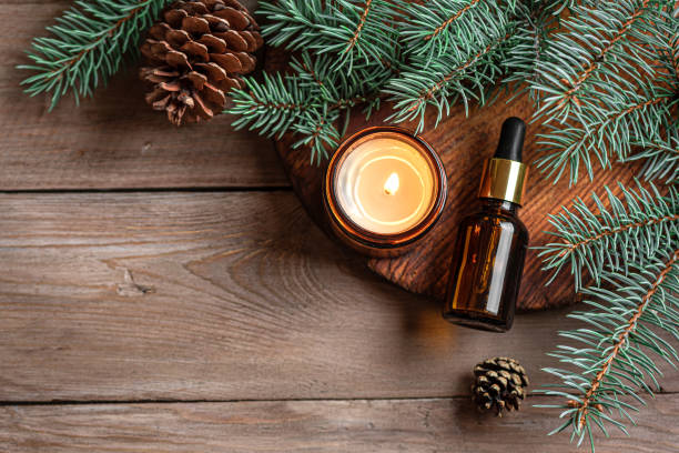 istock Fir or pine essential oil dropper and aroma candle 2189728066
