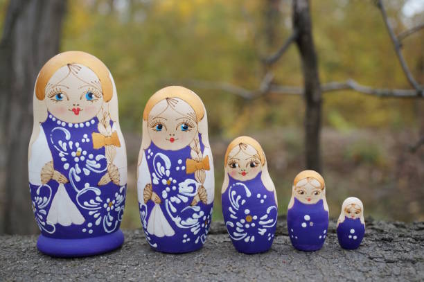 istock Beautiful wooden nesting dolls stand in a row. Traditional dolls. 2189729677