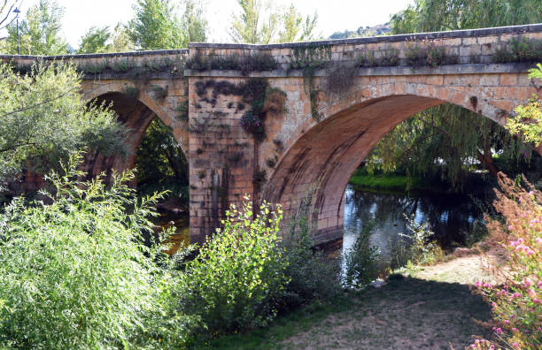 istock Bridge across the Arlanza river in Covarrubias (Spain) 2189729902
