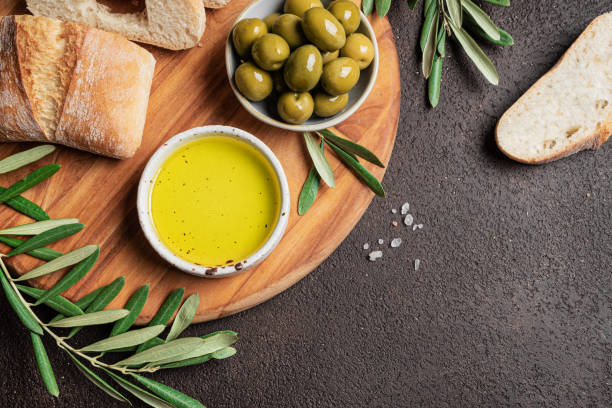 istock Olive Oil, Bread and Green Olives 2189730375