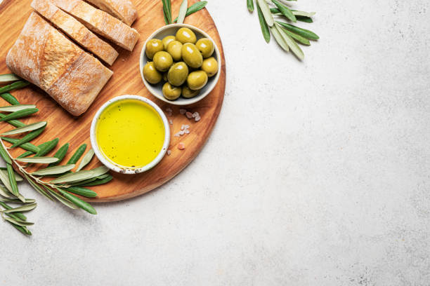 istock Olive Oil, Bread and Green Olives 2189731005