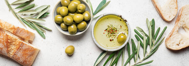 istock Olive oil with olives and bread 2189731699