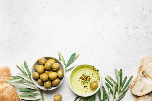 istock Olive oil with olives and bread 2189731805