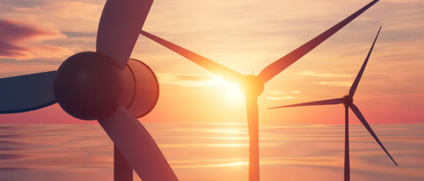 istock A wind turbine is shown in front of a sunset 2189733337