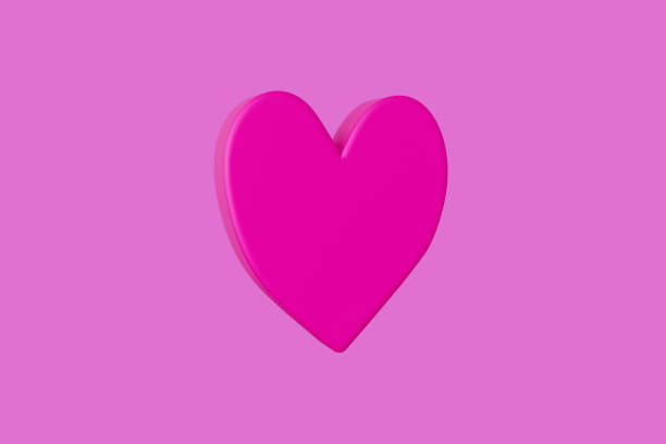 istock A pink heart is shown on a pink background 2189733773
