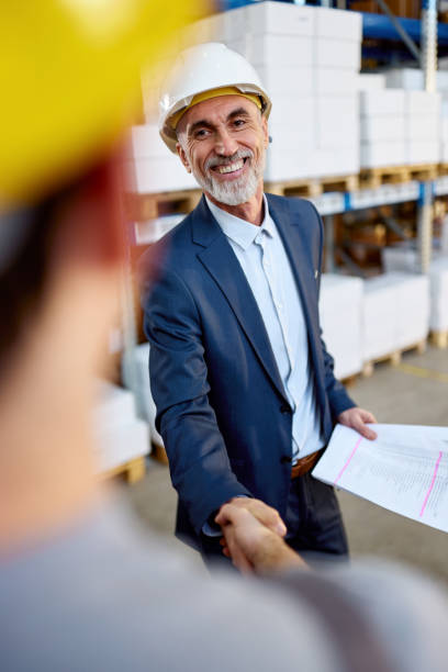 istock Successful deal between inspector and warehouse worker! 2189738668