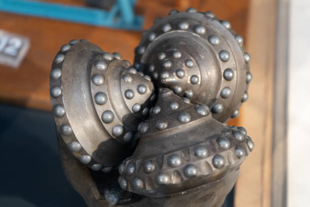 istock Drill bits. Perforator button for water wells. Tricone bit. Equipment for water and coal wells. Drilling three cone 2189740051