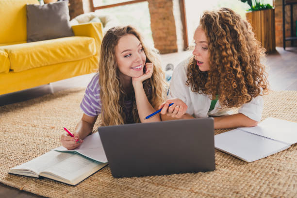 istock Two young women enjoying a cozy study session at home together on a relaxing weekend 2189746263