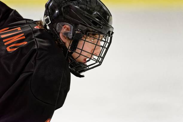 istock Focused young ice hockey player on the rink. 2189749182