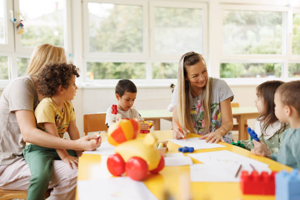 istock Children and teachers draw in kindergarten 2189749442