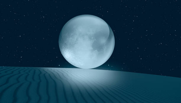 istock Glass or crystal full moon rising over desert at night 2189749753