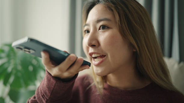 istock Woman asking ai voice on smartphone. 2189751368