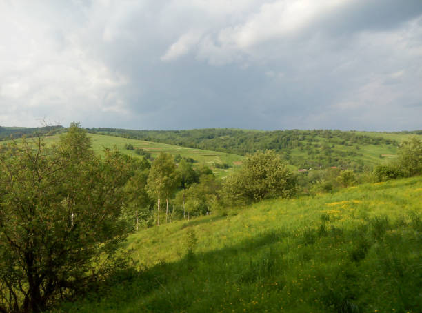 Free Stock Photo of Lush green hills under a cloudy sky | Download Free ...
