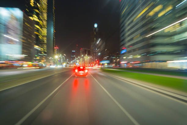 istock Fast ride in the night city, motion blur 2189756920