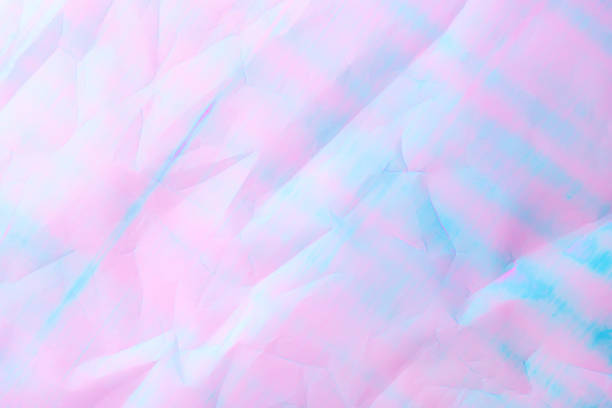 istock An abstract background featuring pastel hues of pink and blue 2189760595