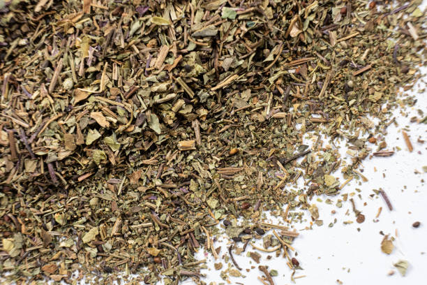 istock Dry basil spice seasoning macro texture top view 2189760841